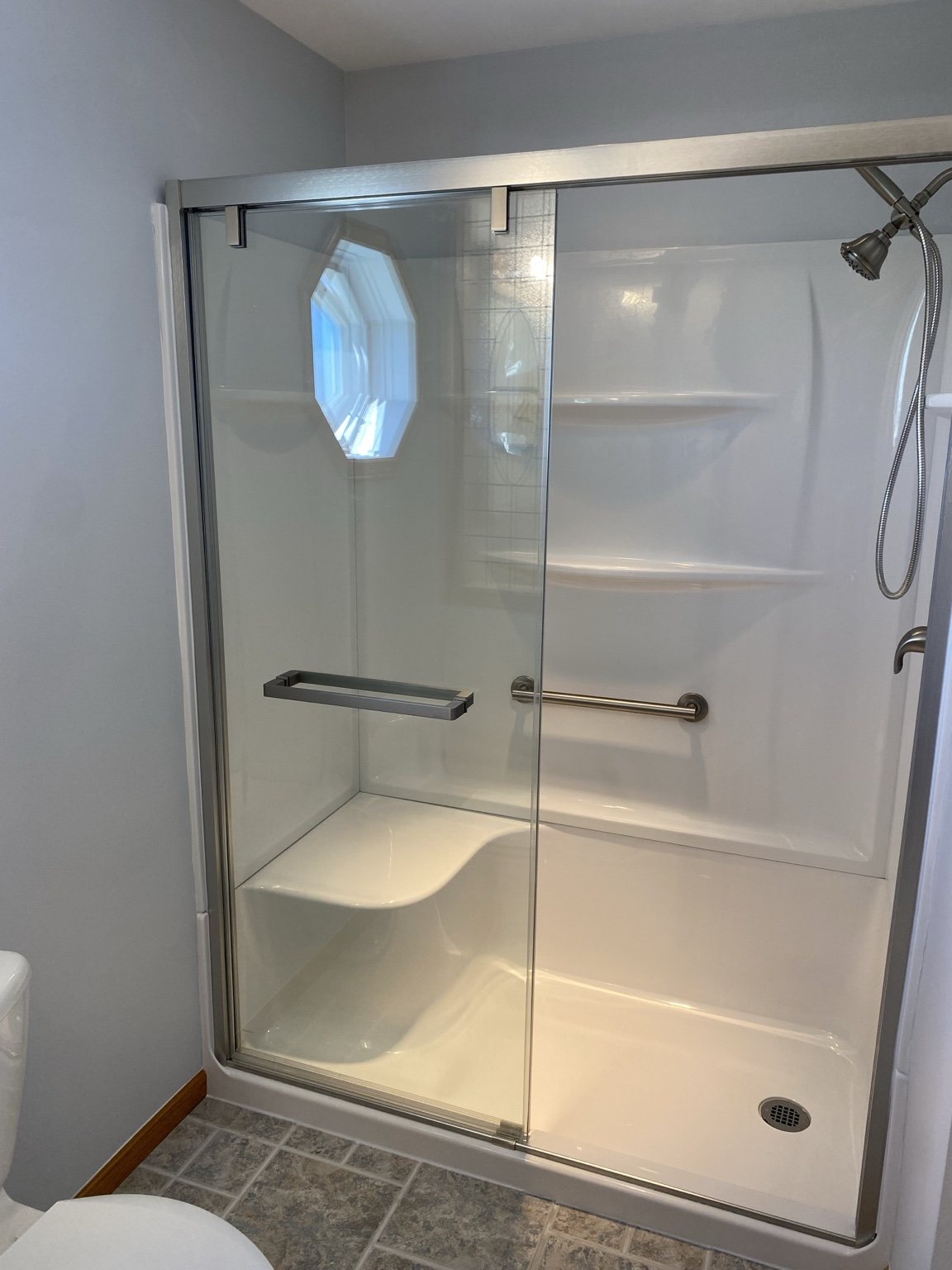 Glass doors on a finished walk-in shower